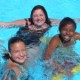 three happy girls in the pool.JPG